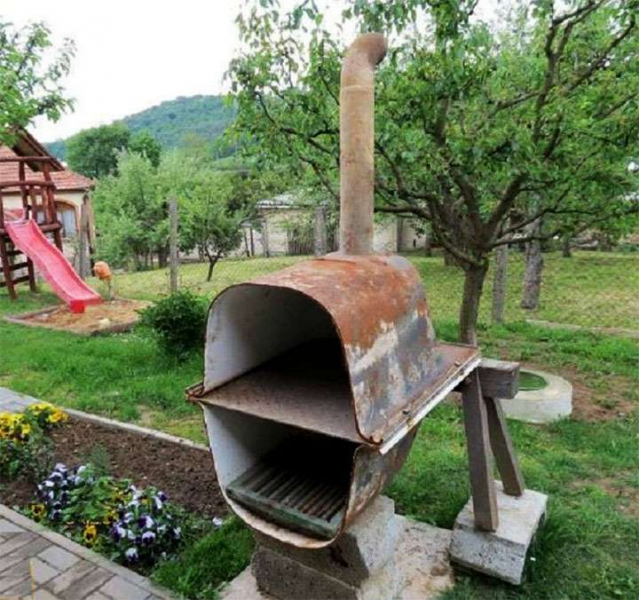 Вторая жизнь старых вещей: дачная печь из чугунной ванны